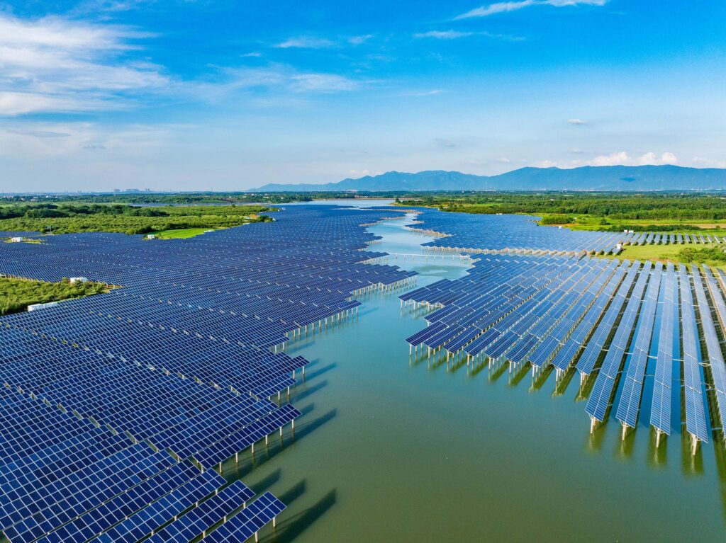 Floating solar panels on water reservoirs generating renewable energy with improved efficiency and no land usage