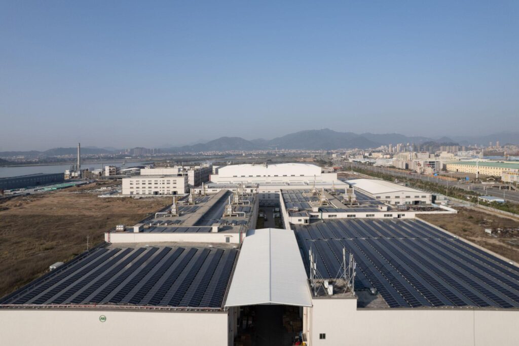 Comparison of ground mount and rooftop solar systems showing panels installed on open land and building rooftops