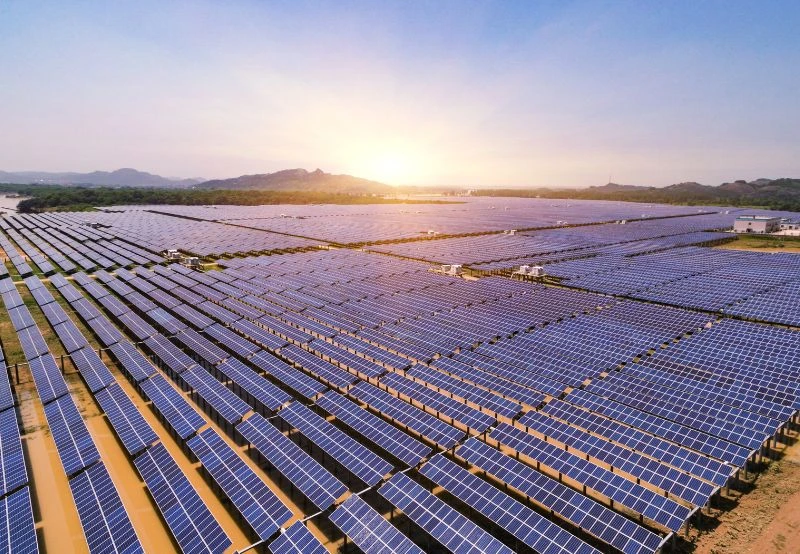 Large ground mounted solar power plant compared with rooftop solar systems for property energy needs