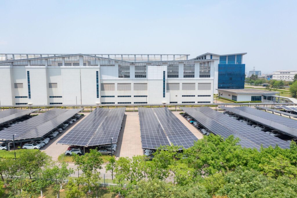 Solar carport system generating renewable energy while providing shaded parking and maximizing unused space