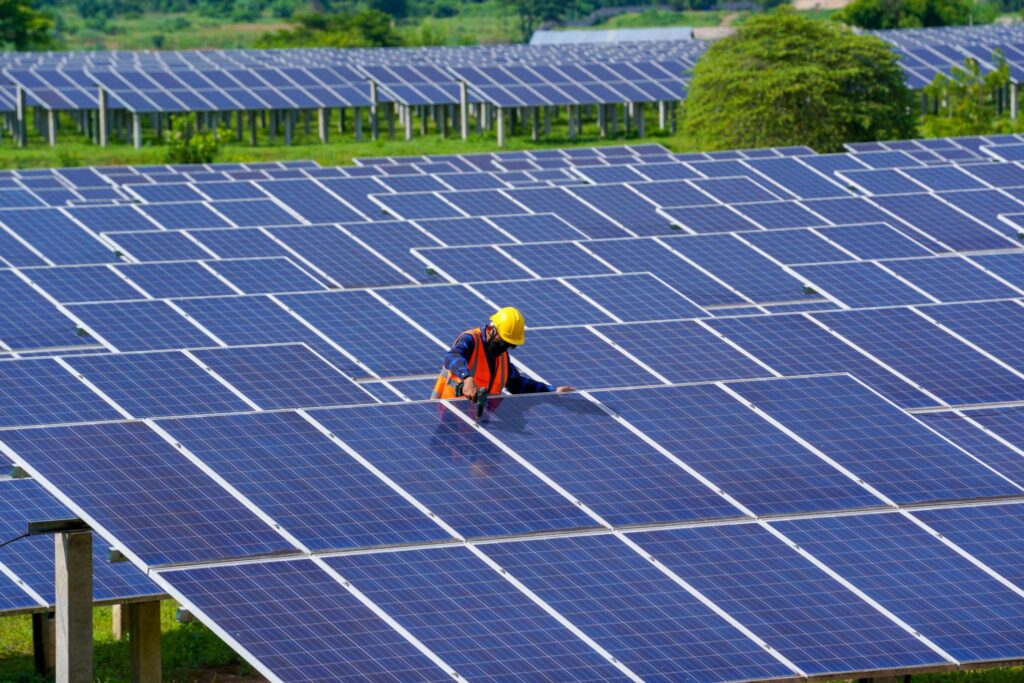 Ground mounted solar panel installation process including site assessment, foundation setup, mounting structure, panel installation, and wiring