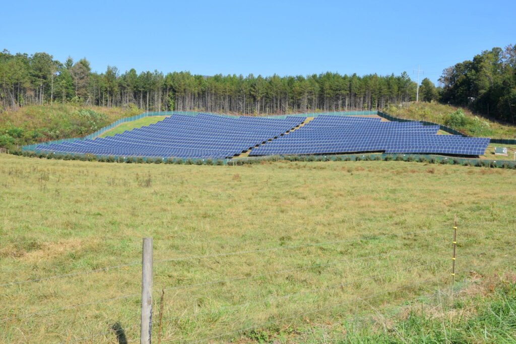 Ground mounted solar panels showing benefits and limitations including efficiency, scalability, space requirements, and maintenance access