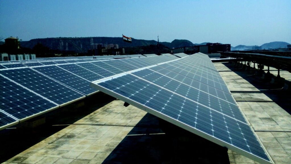 Rooftop solar system cost breakdown showing panels, inverters, mounting structures, and installation components for commercial projects
