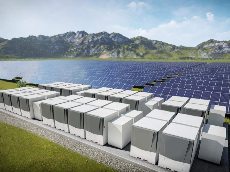 Energy storage units installed near a large ground mounted solar power plant 