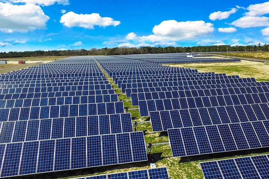 Large utility scale solar power plant with rows of solar panels