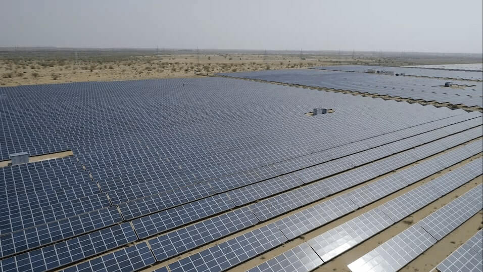 Wide view of a large solar power plant installed on open land