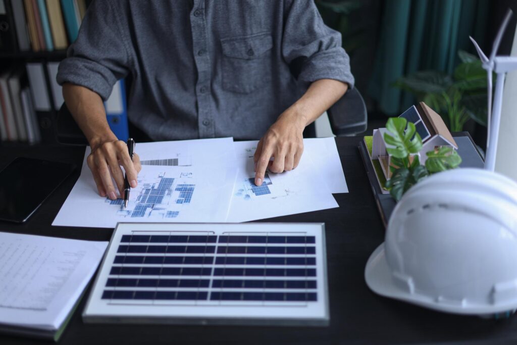 Industrial solar installation process including site assessment, system design, panel installation, and commissioning for commercial projects