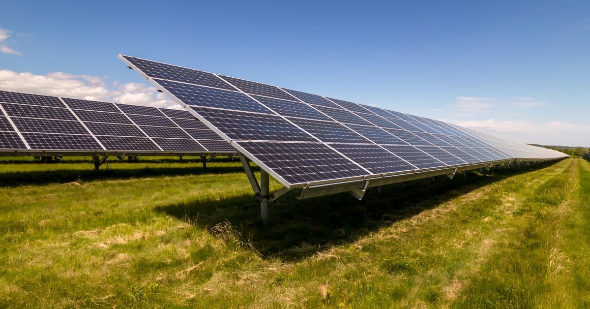 Ground mounted solar panels installed on open land for business energy use